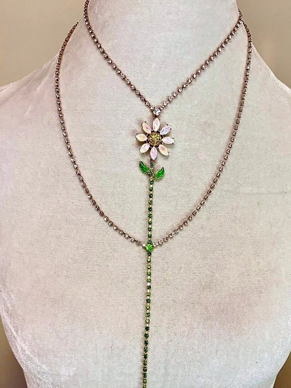 Betsey Johnson Daisy Y-Necklace, highlighted by its whimsical pink and white opa